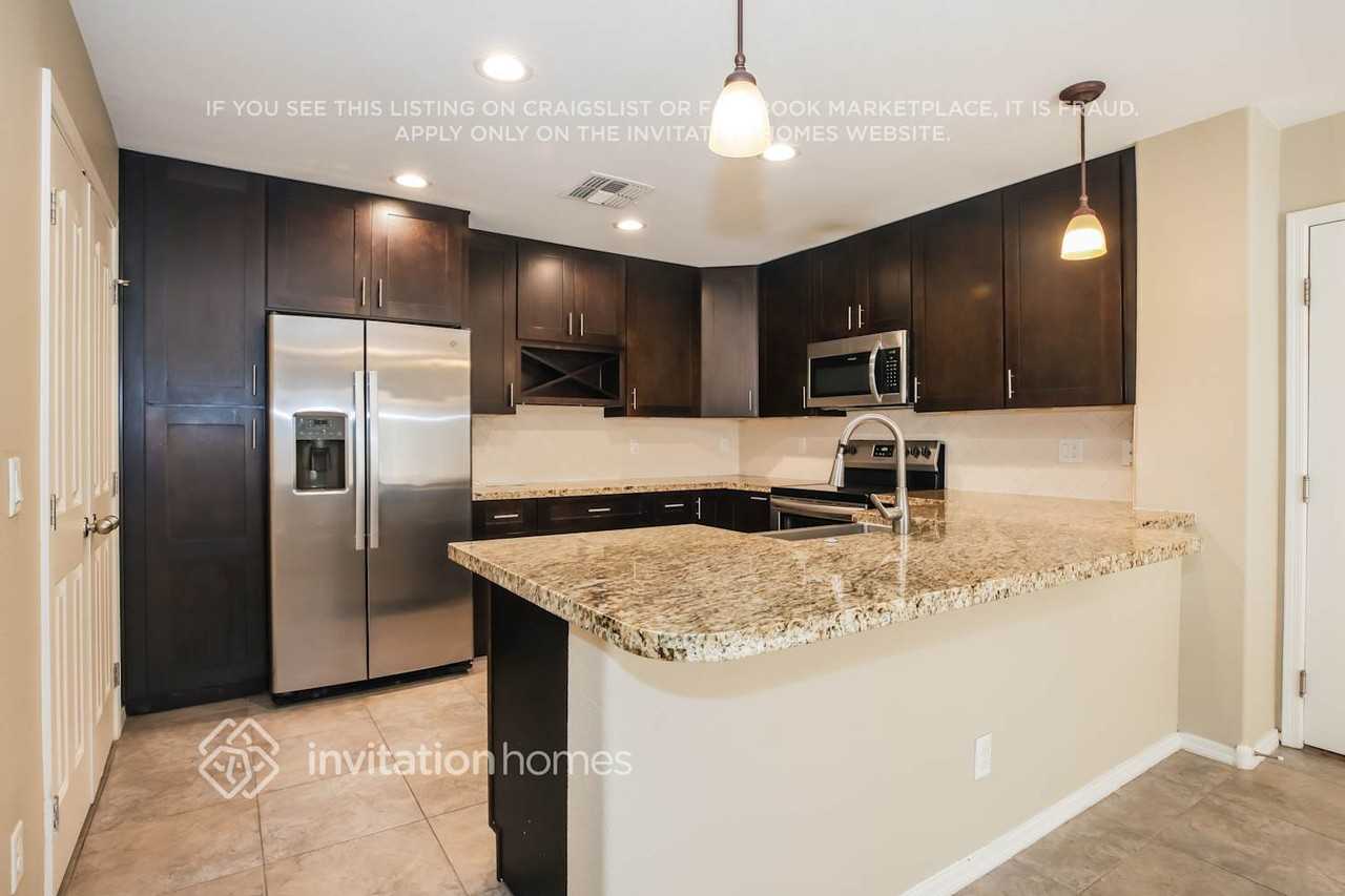 5816 E Harmony Ave - Photo 7 of 17