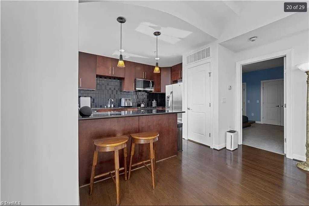 201 N Elm St #308 - Photo 6 of 11