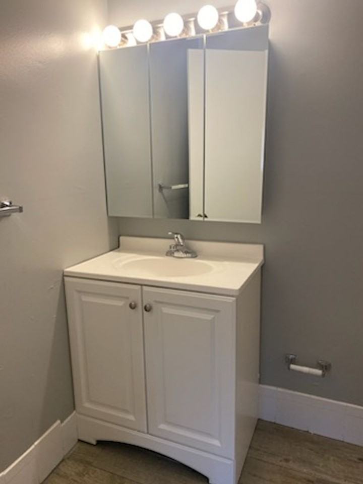 HOLLY GARDEN APARTMENTS - Photo 7 of 14