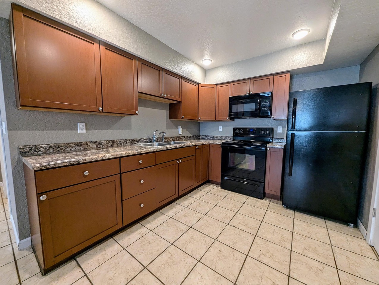 B Ave Apartments - Photo 3 of 50