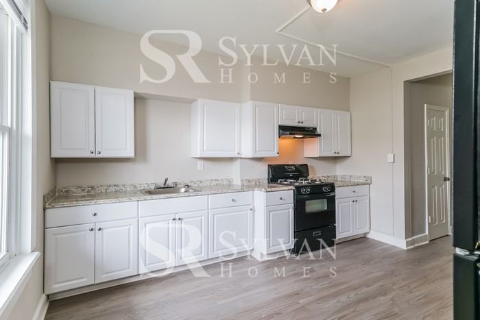 410 S Newkirk St - Photo 7 of 16