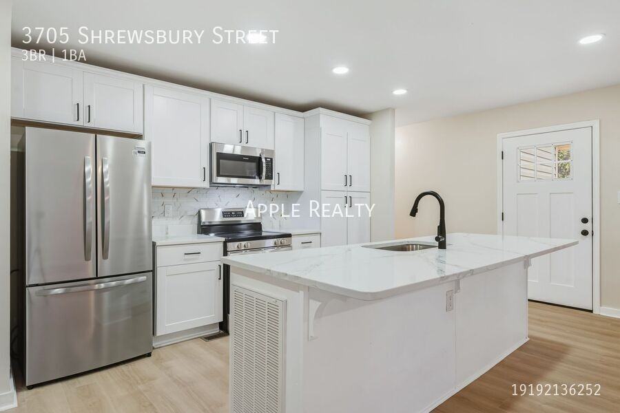 3705 Shrewsbury St - Photo 5 of 13