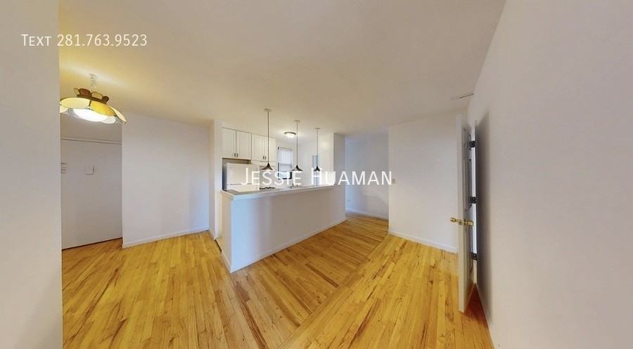 300 1/2 E 65th St #PH - Photo 2 of 9