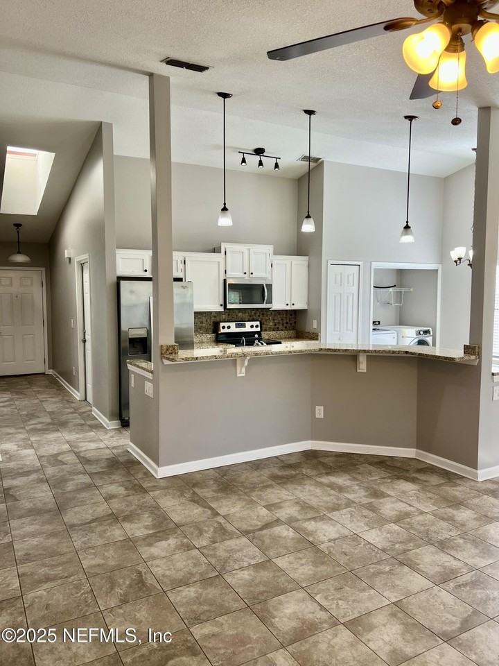 7820 Collins Ridge Blvd E - Photo 3 of 17