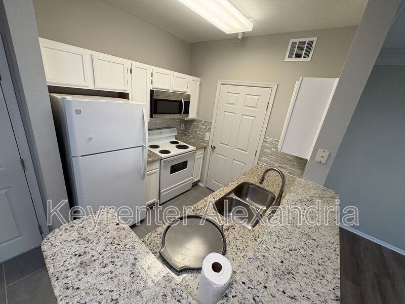 1571 Spring Gate Dr #6209 - Photo 6 of 17