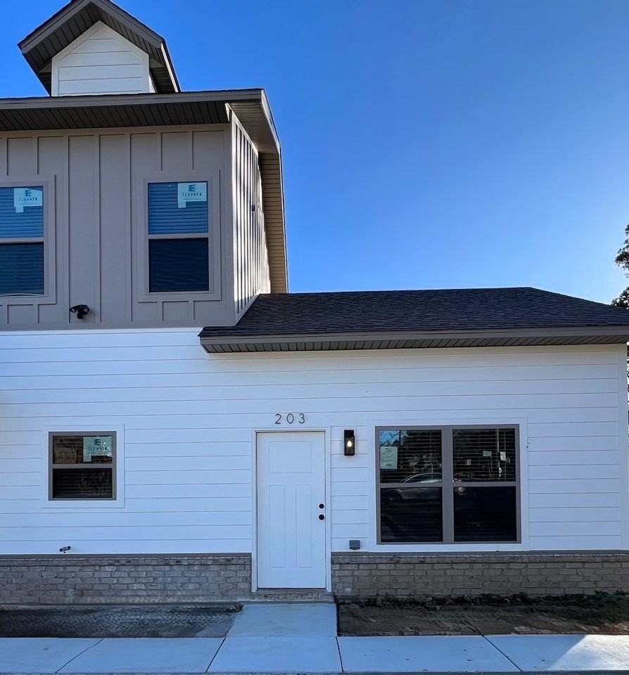 12TH STREET TOWNHOMES OF FAYETTEVILLE LLC - Photo 2 of 30