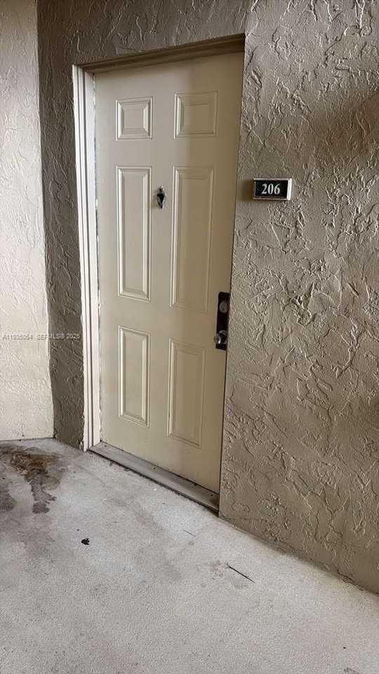 1705 Palm Cove Blvd #1-206 - Photo 3 of 23