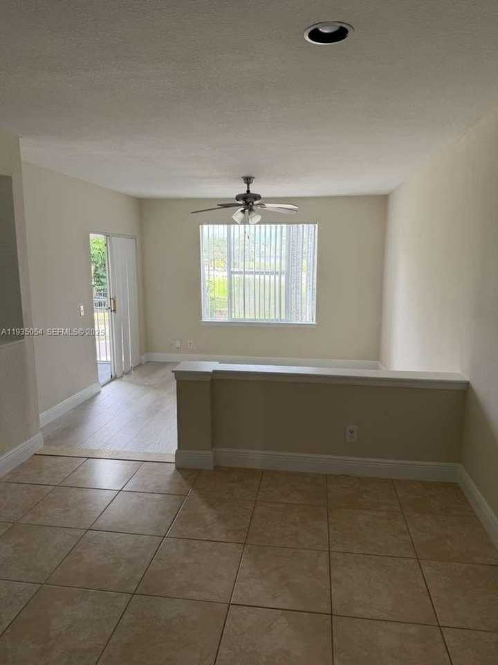 1705 Palm Cove Blvd #1-206 - Photo 4 of 23
