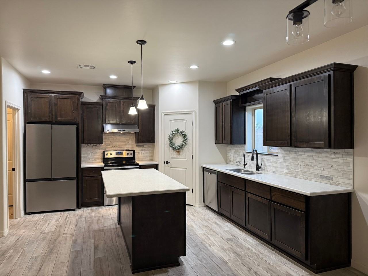 12689 E 48th Dr - Photo 2 of 18