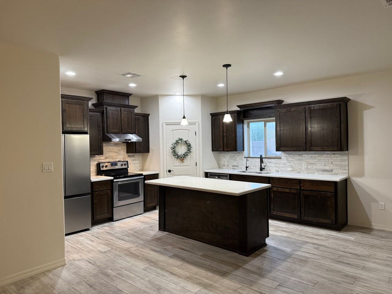 12689 E 48th Dr - Photo 3 of 18