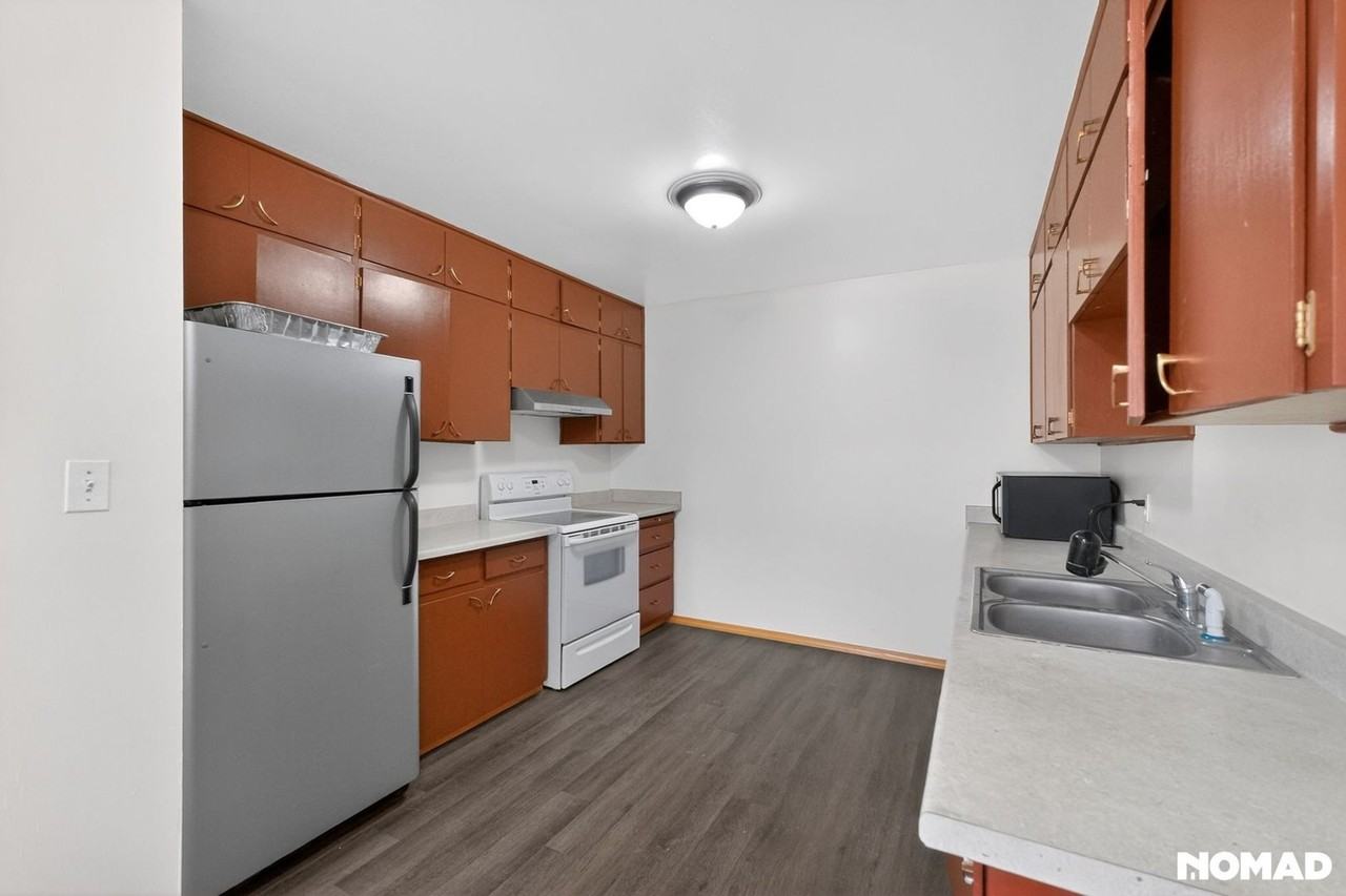 7733 Mcdougal Ave Ne - Photo 2 of 25