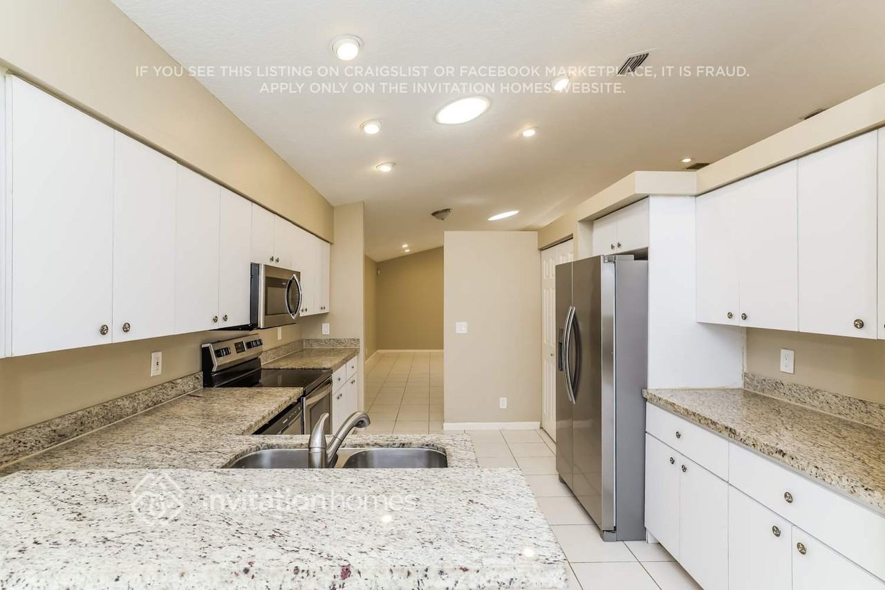 7664 Stirling Bridge Blvd N - Photo 7 of 17