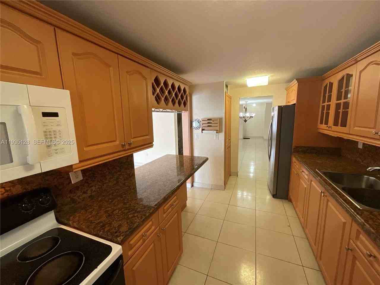 895 W 79th Pl - Photo 7 of 38