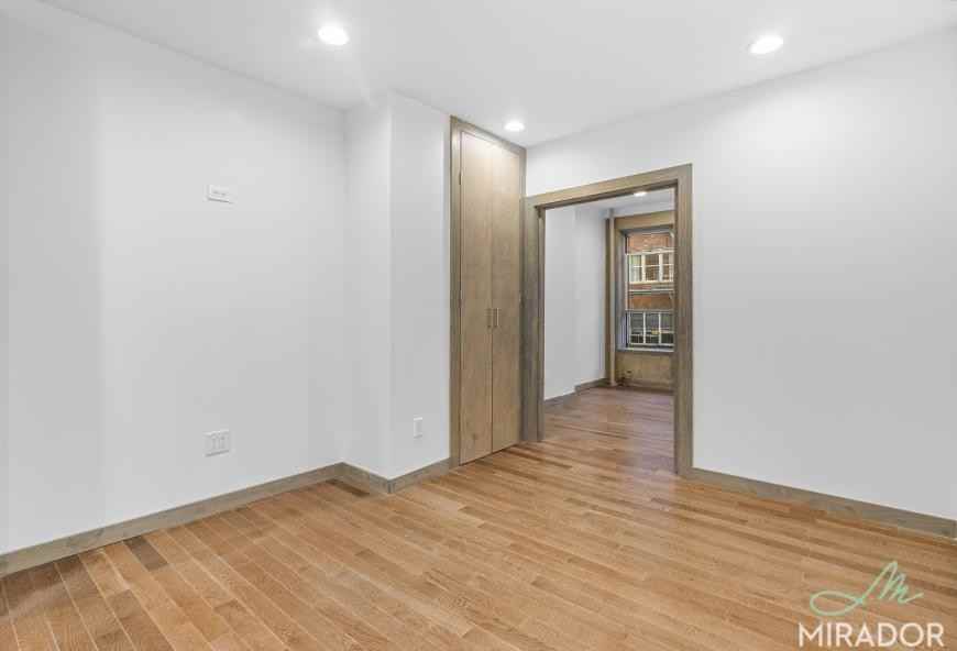 332 E 9th St - Photo 4 of 8