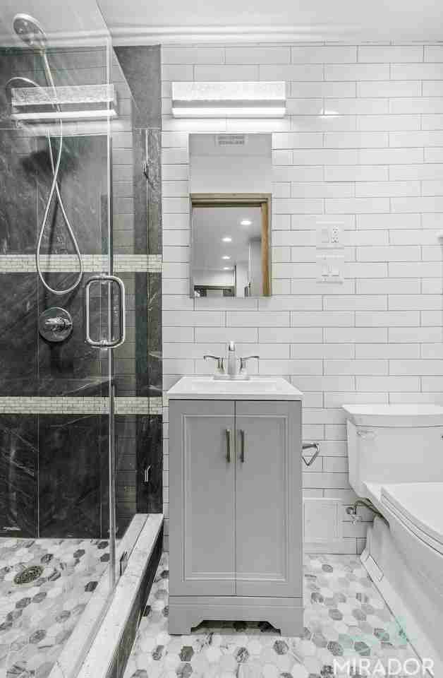 332 E 9th St - Photo 5 of 8