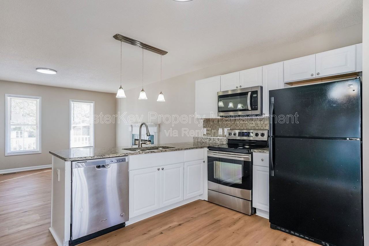 5701 Woof Pl - Photo 5 of 27