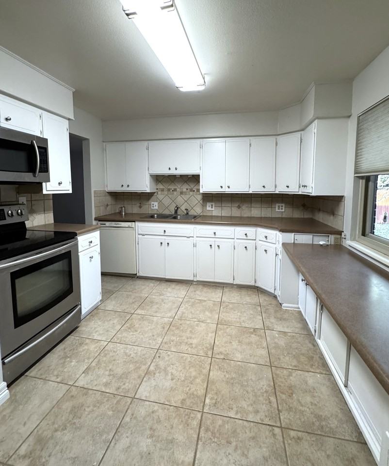 3084 S Xanthia St #1 - Photo 2 of 31