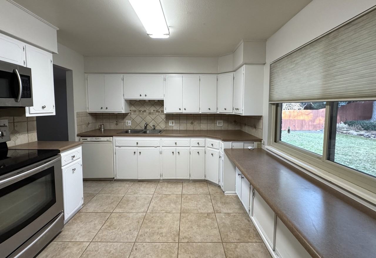 3084 S Xanthia St #1 - Photo 6 of 31