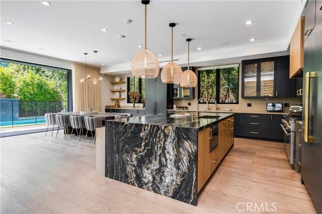 5517 Allott Ave - Photo 3 of 8