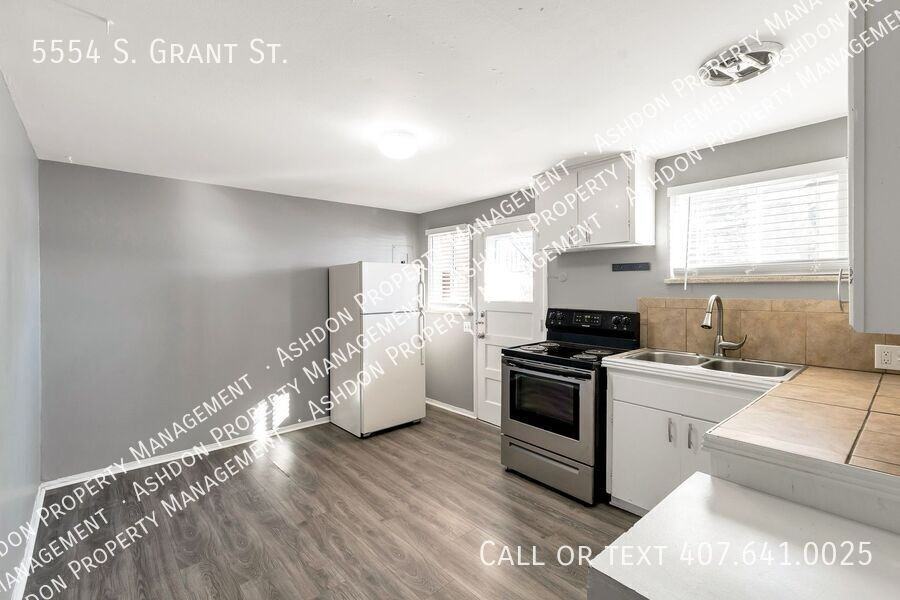5554 S Grant St - Photo 2 of 6