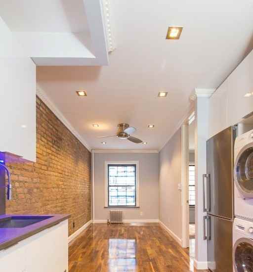 E 11th St #2A - Photo 4 of 7