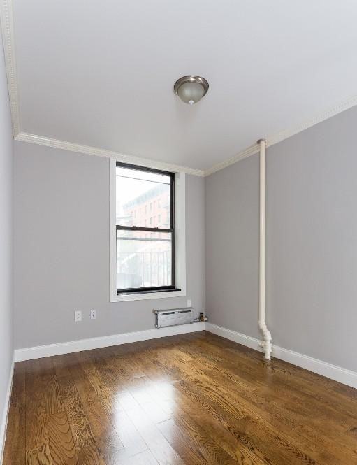 E 10th St #6 - Photo 2 of 7