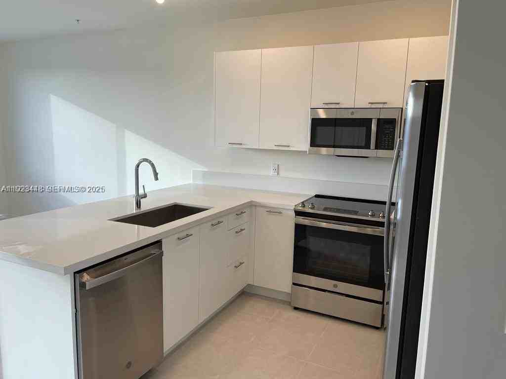 6453 Nw 102nd Path #6453-305 - Photo 6 of 37