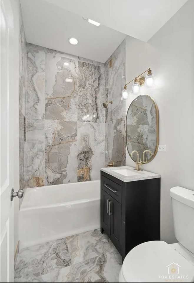 5753 S Peoria St #2 - Photo 3 of 12