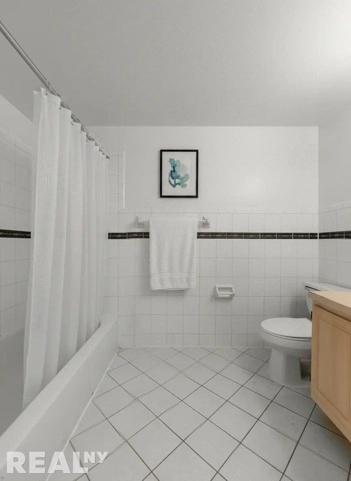 E 8th St #2B - Photo 4 of 13