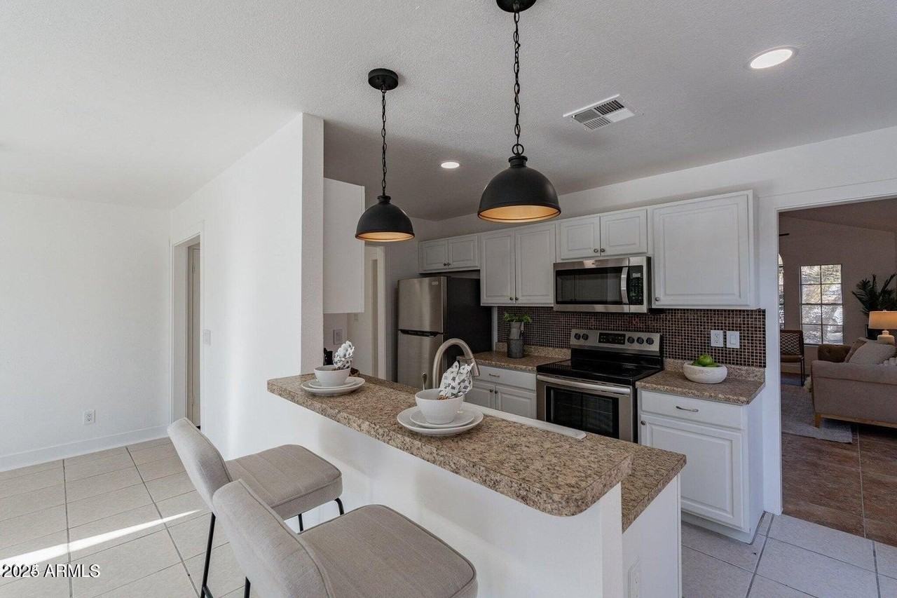 5248 N 102nd Ave - Photo 6 of 14