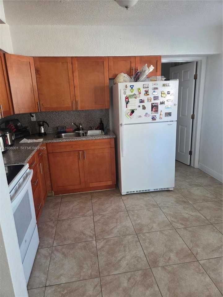 5031 Nw 173rd St - Photo 4 of 16