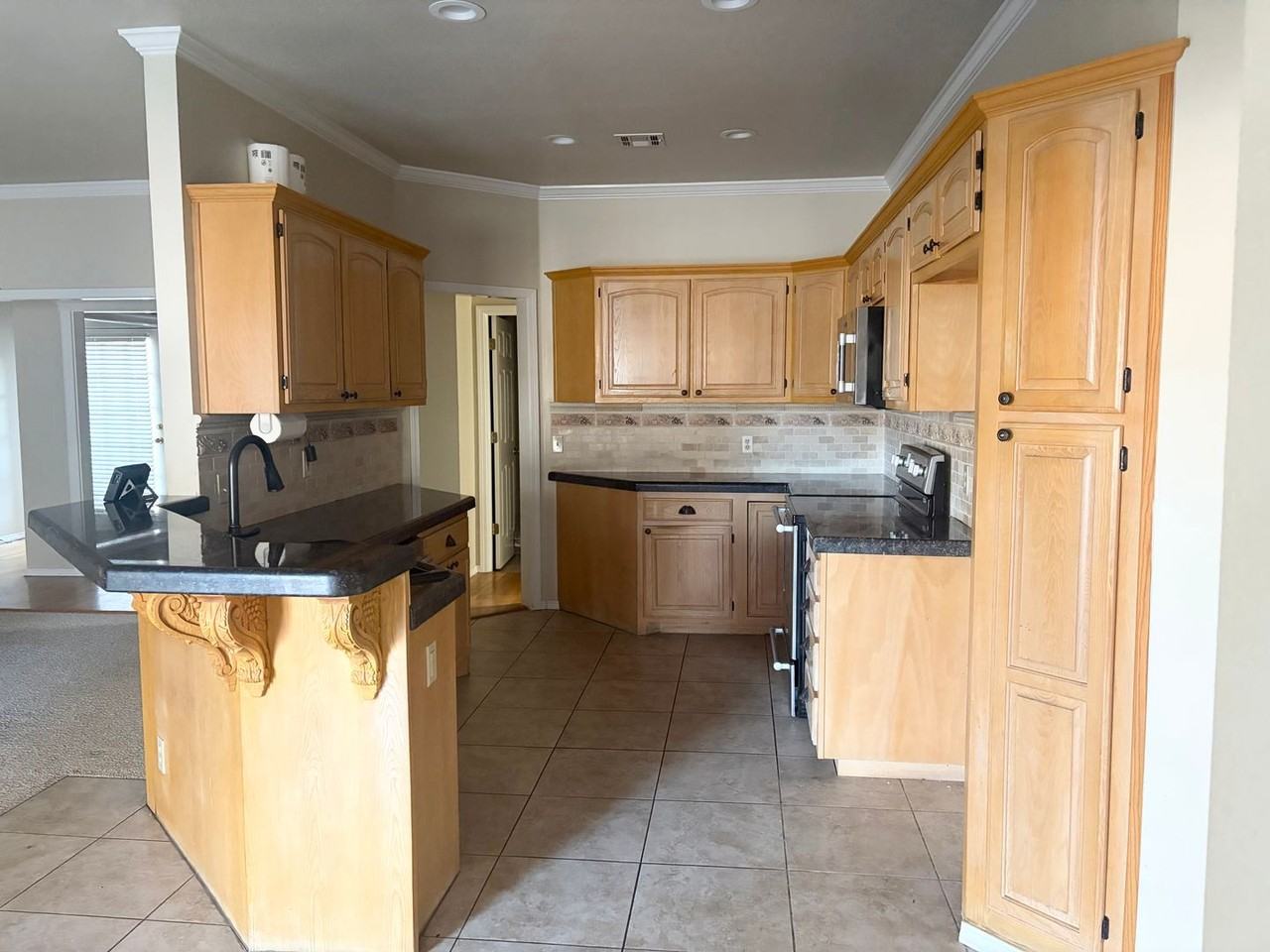 8913 E 100th Dr - Photo 7 of 15