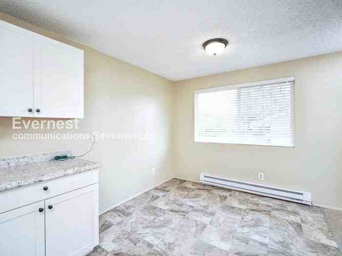 301 E 2nd St - Photo 4 of 16