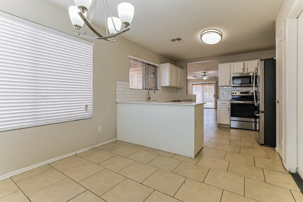 2513 N 114th Ave - Photo 7 of 16