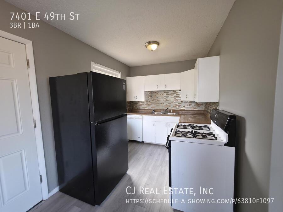 7401 E 49th St - Photo 7 of 11