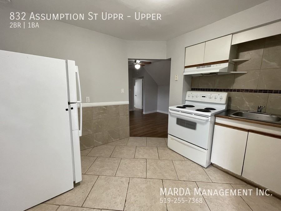 832 Assumption St Uppr - Photo 5 of 13