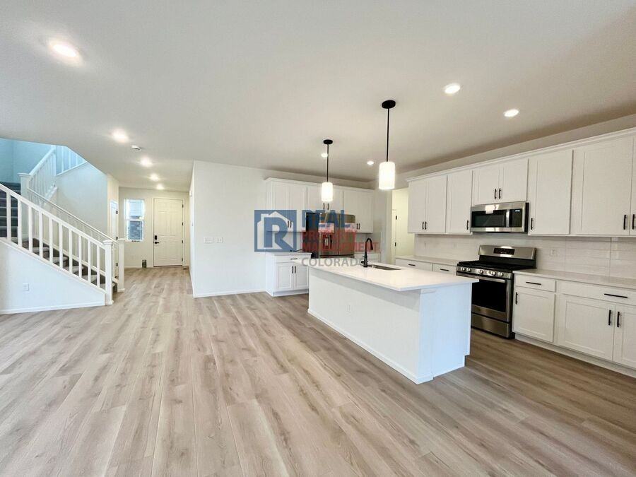 20765 E 57th Dr - Photo 2 of 8