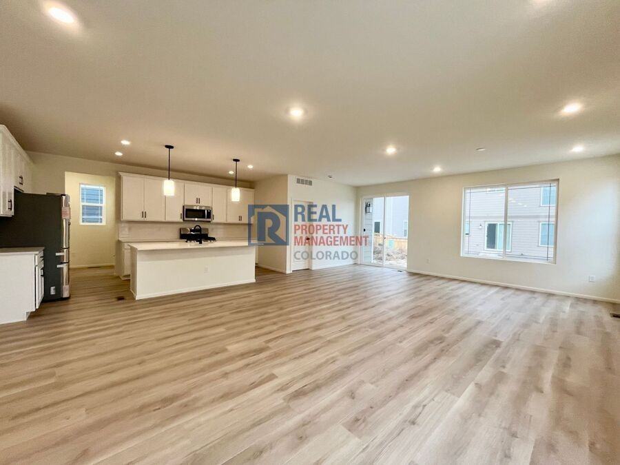 20765 E 57th Dr - Photo 3 of 8