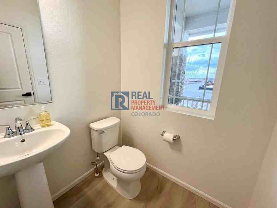 20765 E 57th Dr - Photo 4 of 8