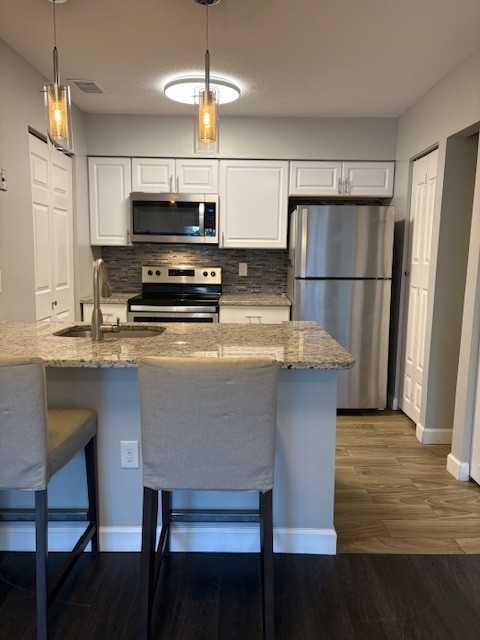 7596 Lakeside Village Dr #H - Photo 2 of 12