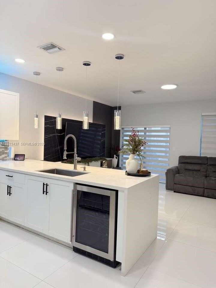 10598 W 33rd Ct - Photo 5 of 25