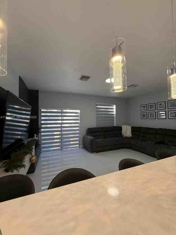 10598 W 33rd Ct - Photo 6 of 25