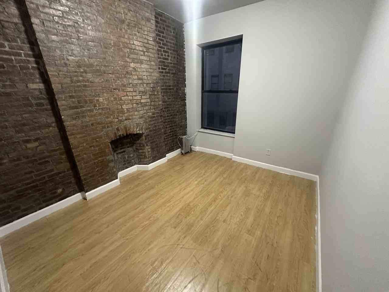 W 51st St - Photo 2 of 5