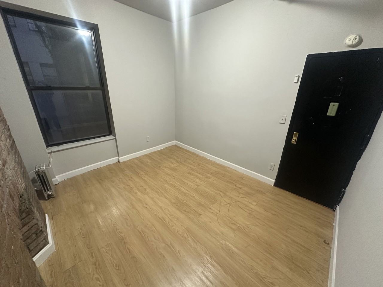 W 51st St - Photo 3 of 5