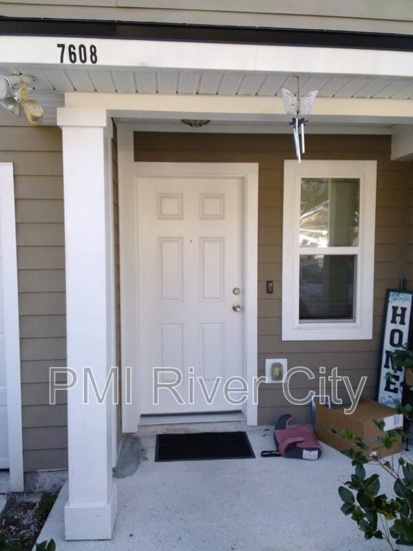 7608 Rain Forest Dr N - Photo 2 of 6