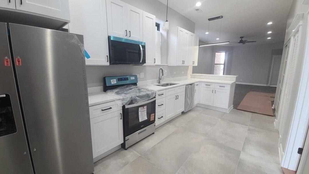 6443 S Peoria St Unit 1 #1 - Photo 2 of 13