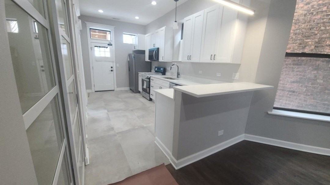 6443 S Peoria St Unit 1 #1 - Photo 4 of 13