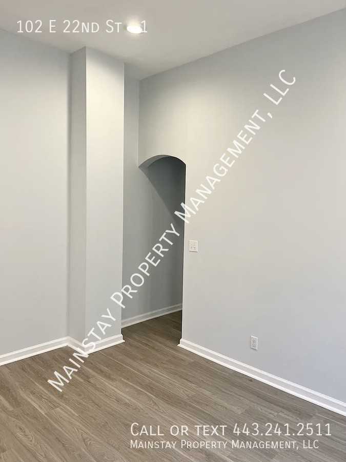 102 E 22nd St #1 - Photo 3 of 16