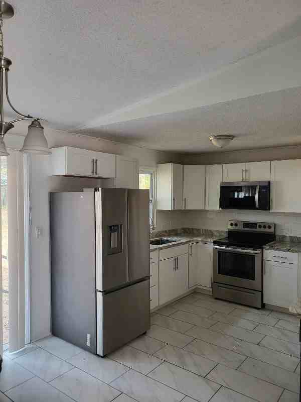 3936 Trescott Ct - Photo 4 of 16