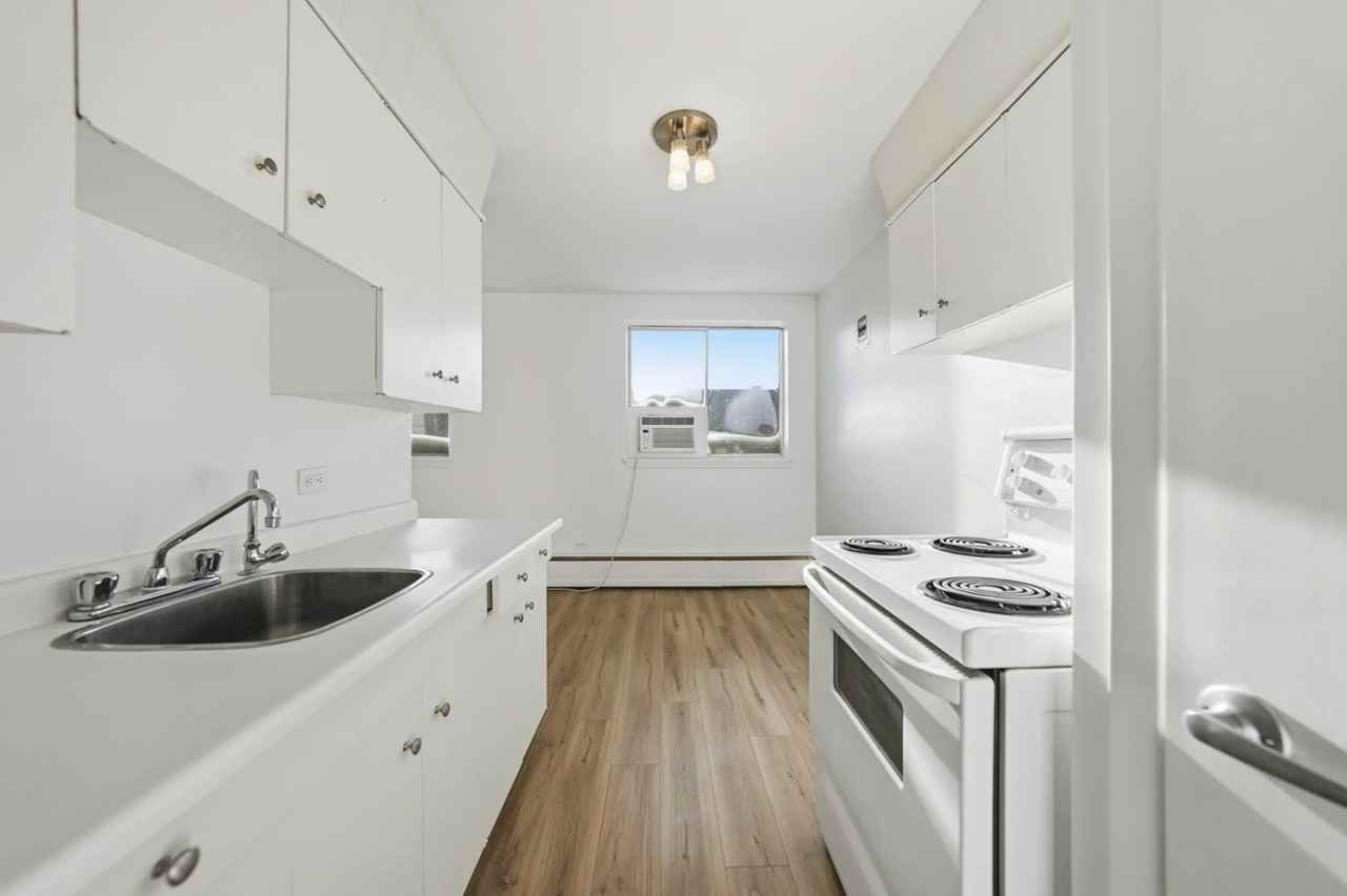 Lady Robinson Apartments - Photo 2 of 24